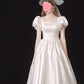 Französisches leichtes Hochzeitskleid aus Satin, Vintage-Ausflugs-Shooting, Brautkleid